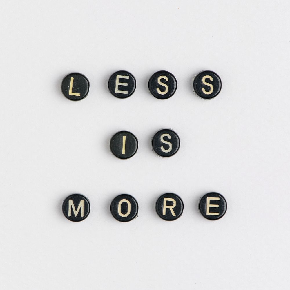 LESS IS MORE beads message typography
