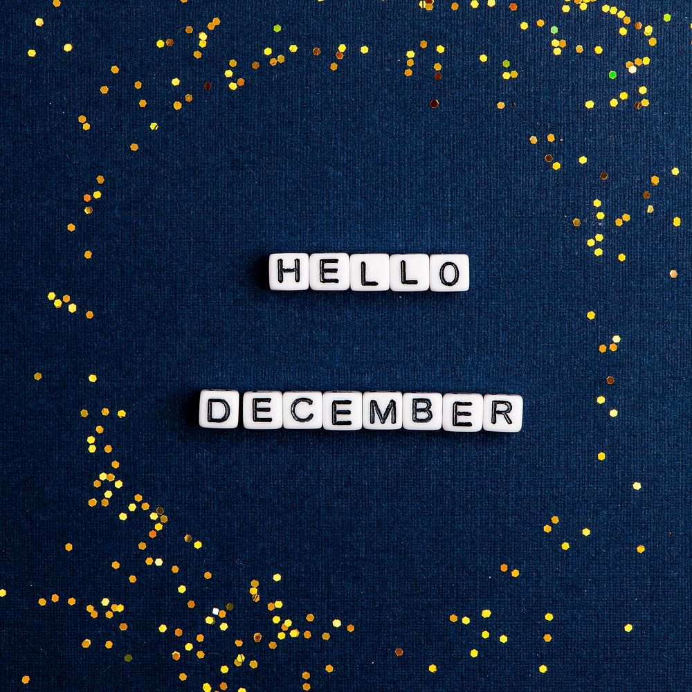 White HELLO DECEMBER beads message typography