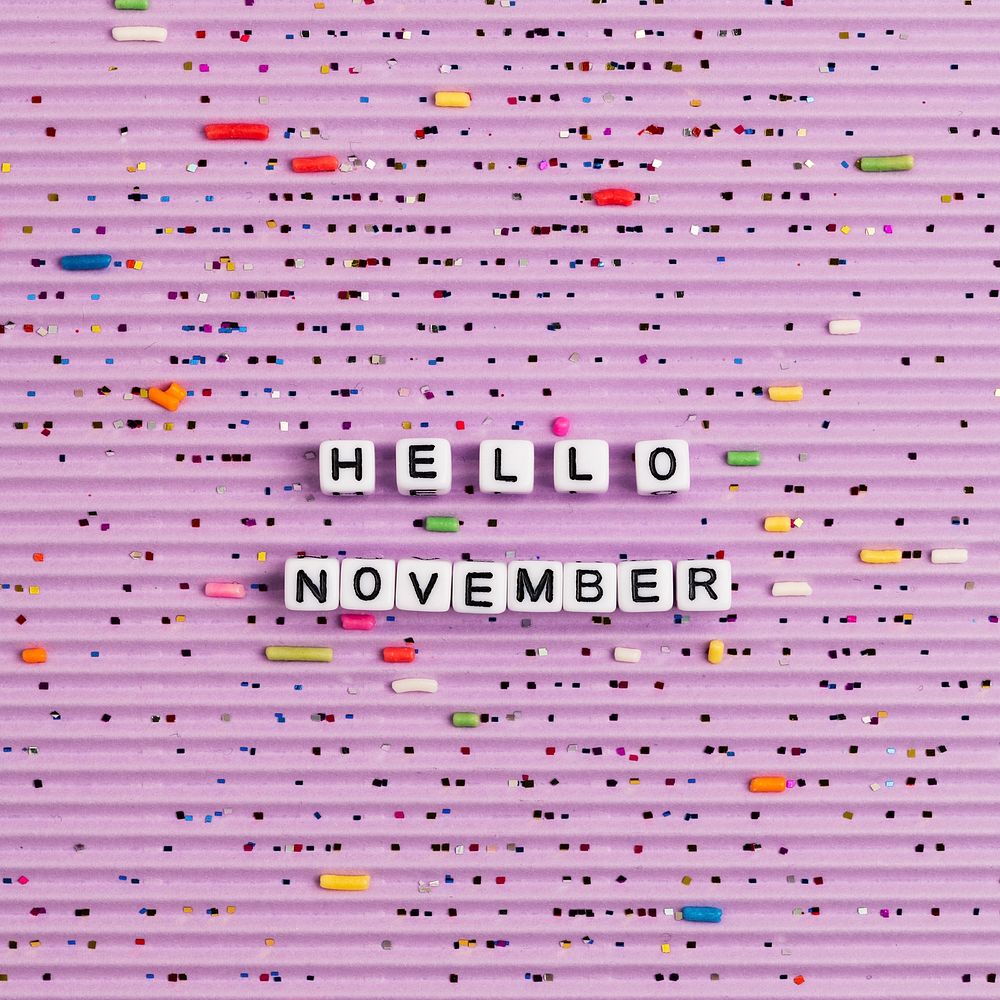 White HELLO NOVEMBER beads message typography
