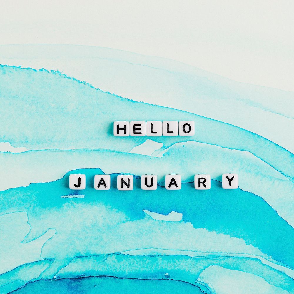 HELLO JANUARY beads message typography on blue