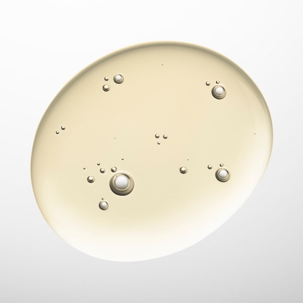 Gold oil liquid bubble macro psd cosmetic product