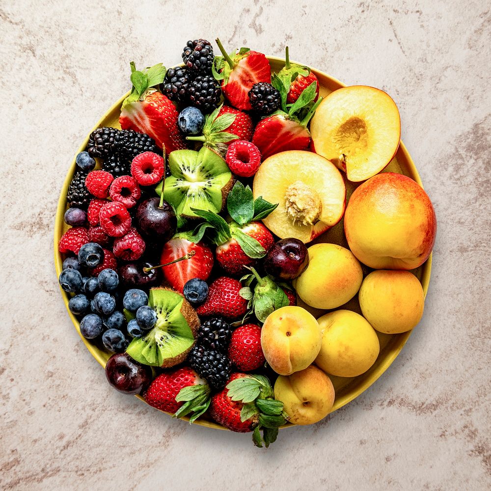 Healthy fruit salad png flat lay with peaches and kiwis food photography