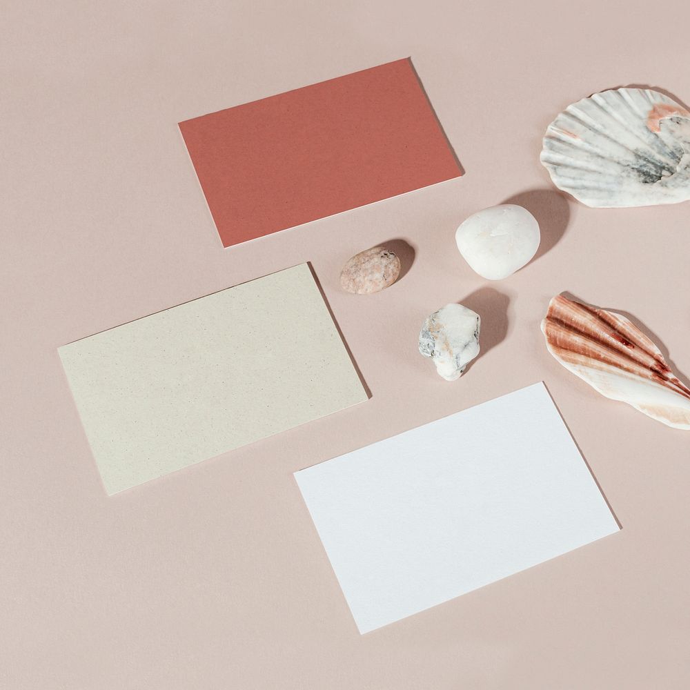 Business cards decorated with stones and seashells mockup