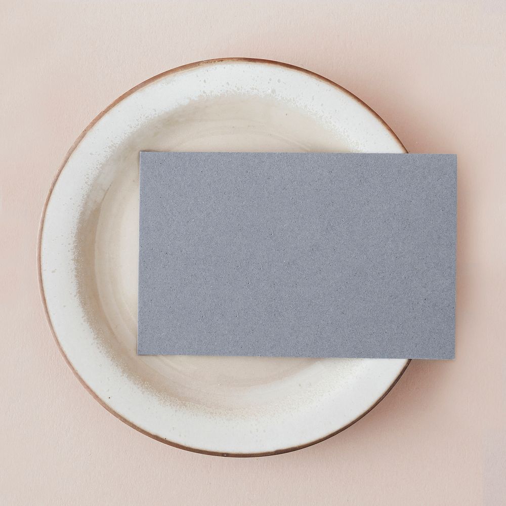 Blue business card on a plate