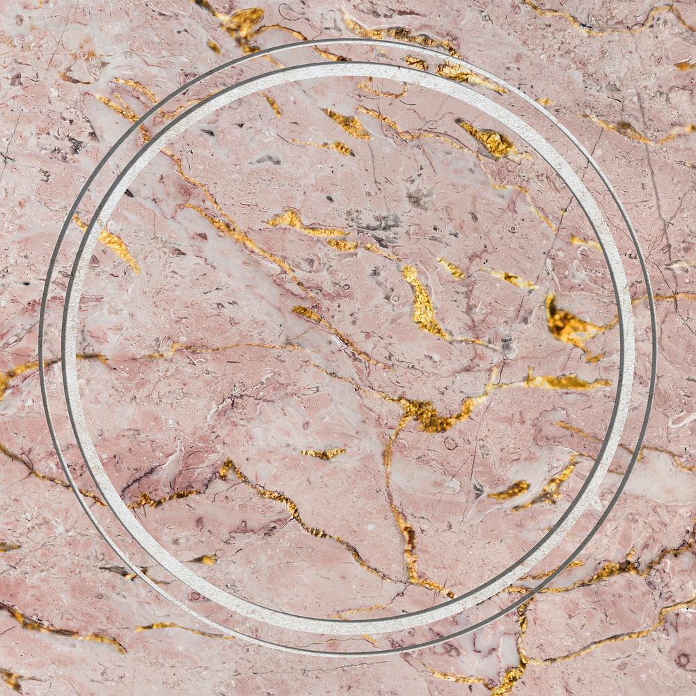 Round frame on pink marble textured background