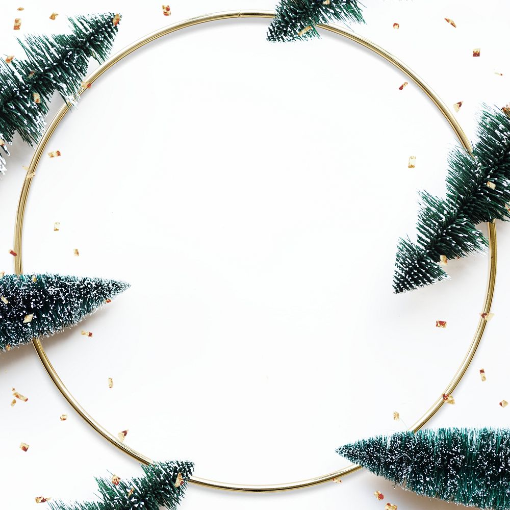 Round gold frame mockup with Christmas tree decorations