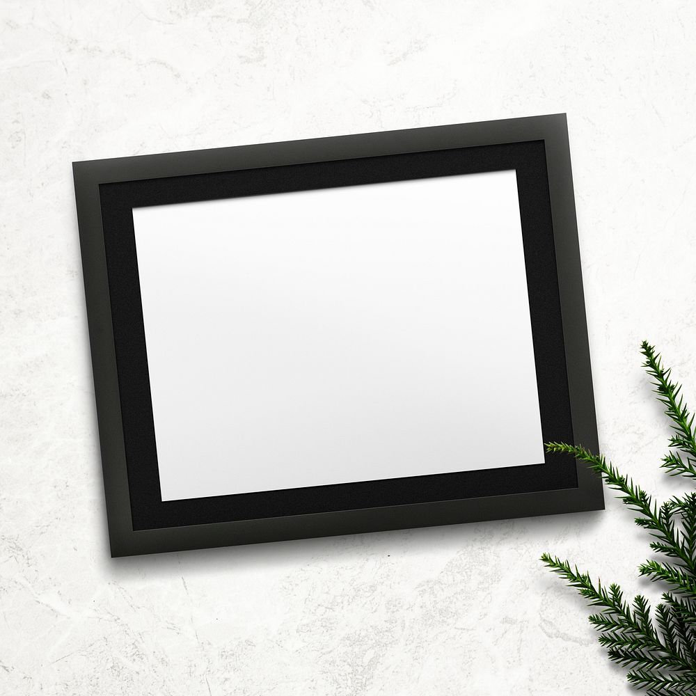 Frame mockup with Christmas decorations on white background