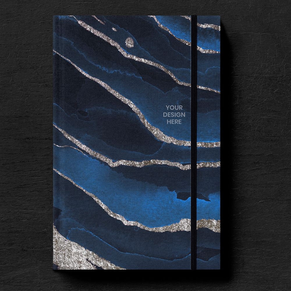 Dark blue book cover mockup on a black table