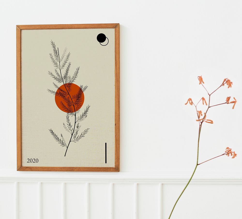 Wooden picture frame hanging on a white wall mockup