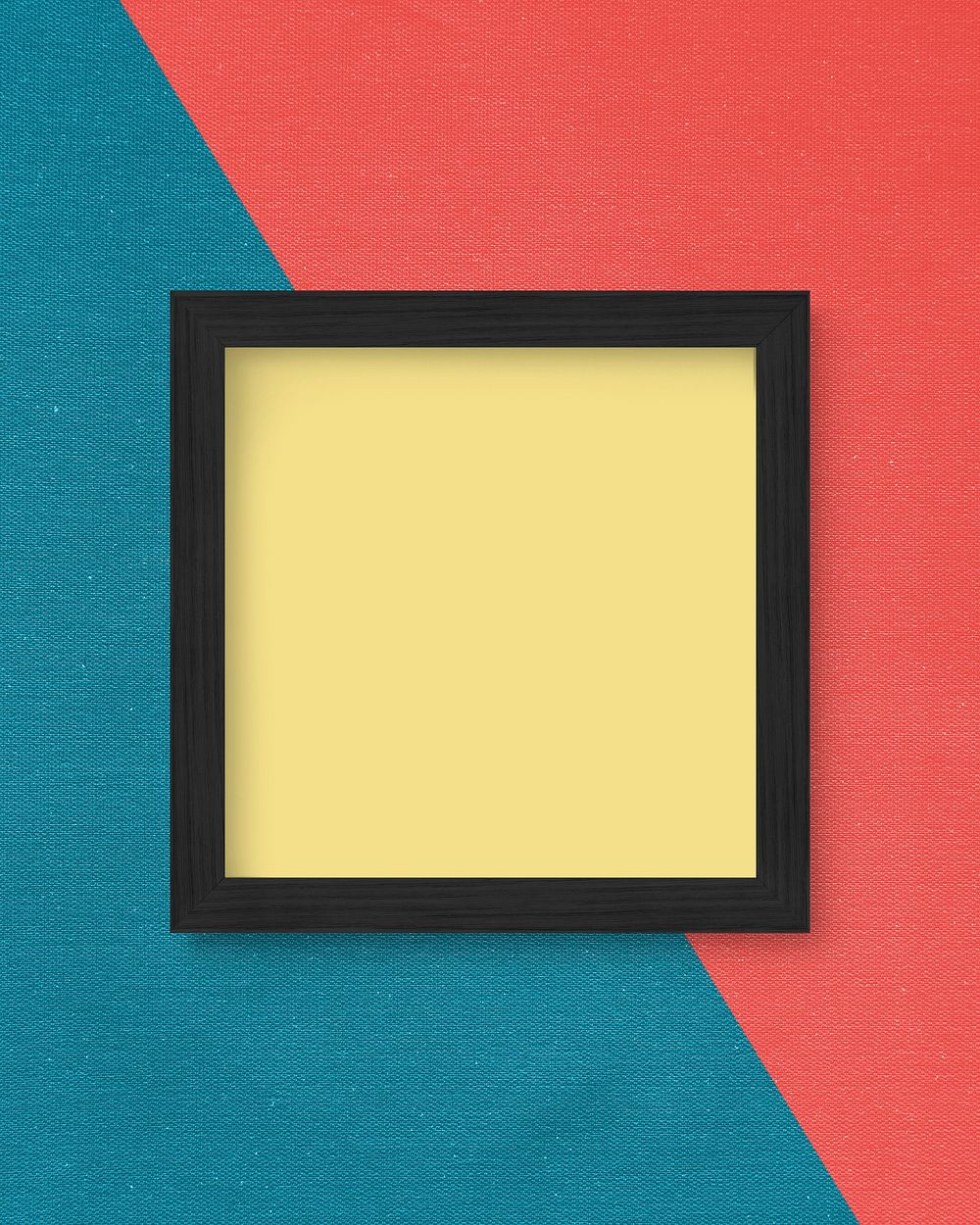 Blank frame mockup on a textured wall