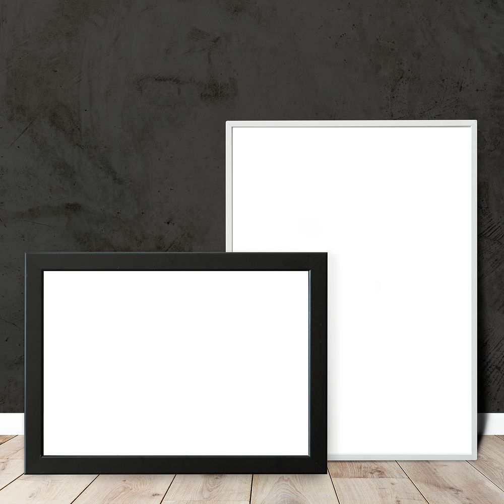 Frame mockups against a black wall