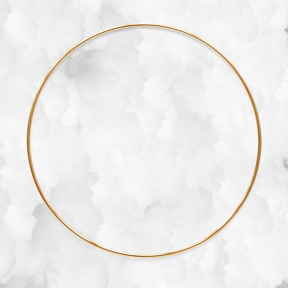 Round  gold frame on a crumpled white paper textured background