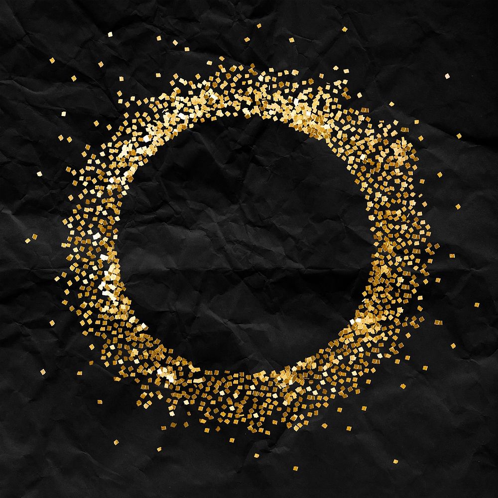 Glittery round frame on a crumpled black paper textured background