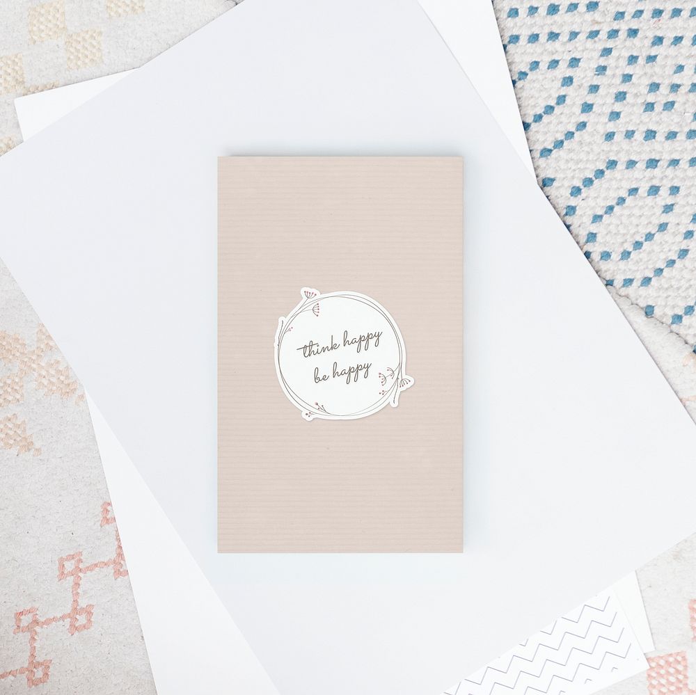 Think happy be happy badge on a beige paper mockup