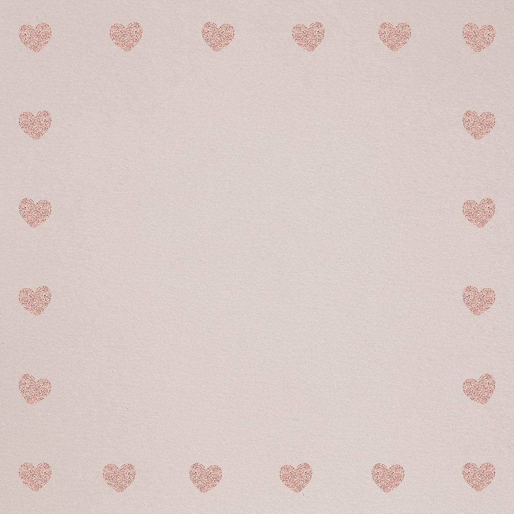 Pink heart patterned frame on a light brown background