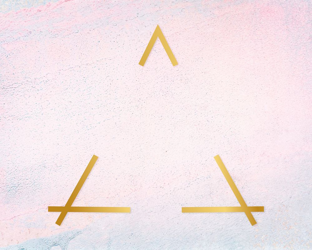 Gold triangle frame on a pastel concrete background