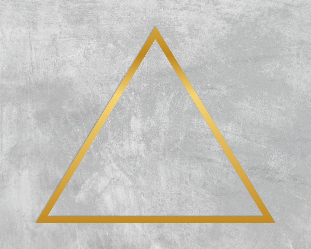 Gold triangle frame on a gray concrete textured background