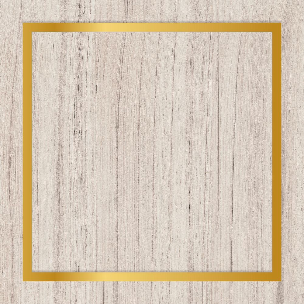 Gold square frame on a wooden background