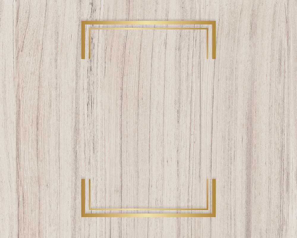Gold rectangle frame on a wooden background