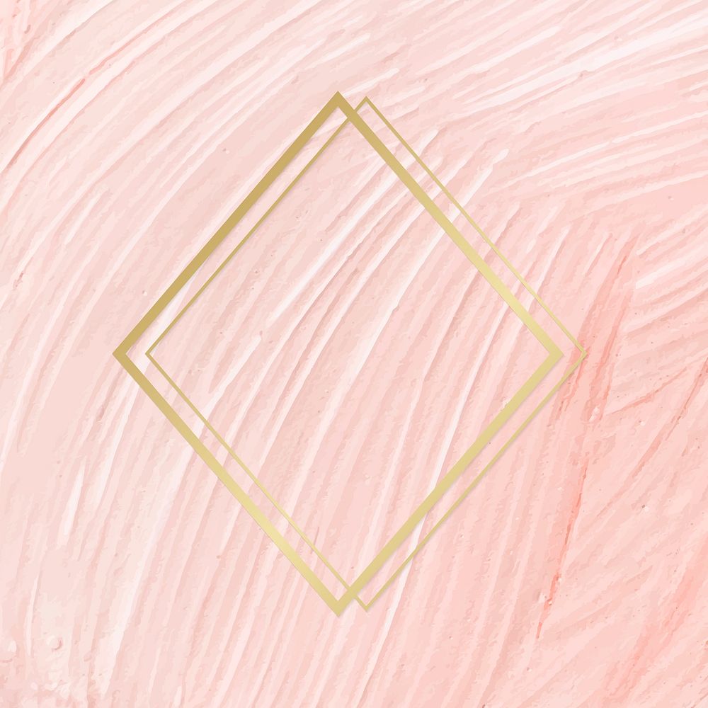 Gold rhombus frame on a pastel pink paintbrush stroke patterned background vector