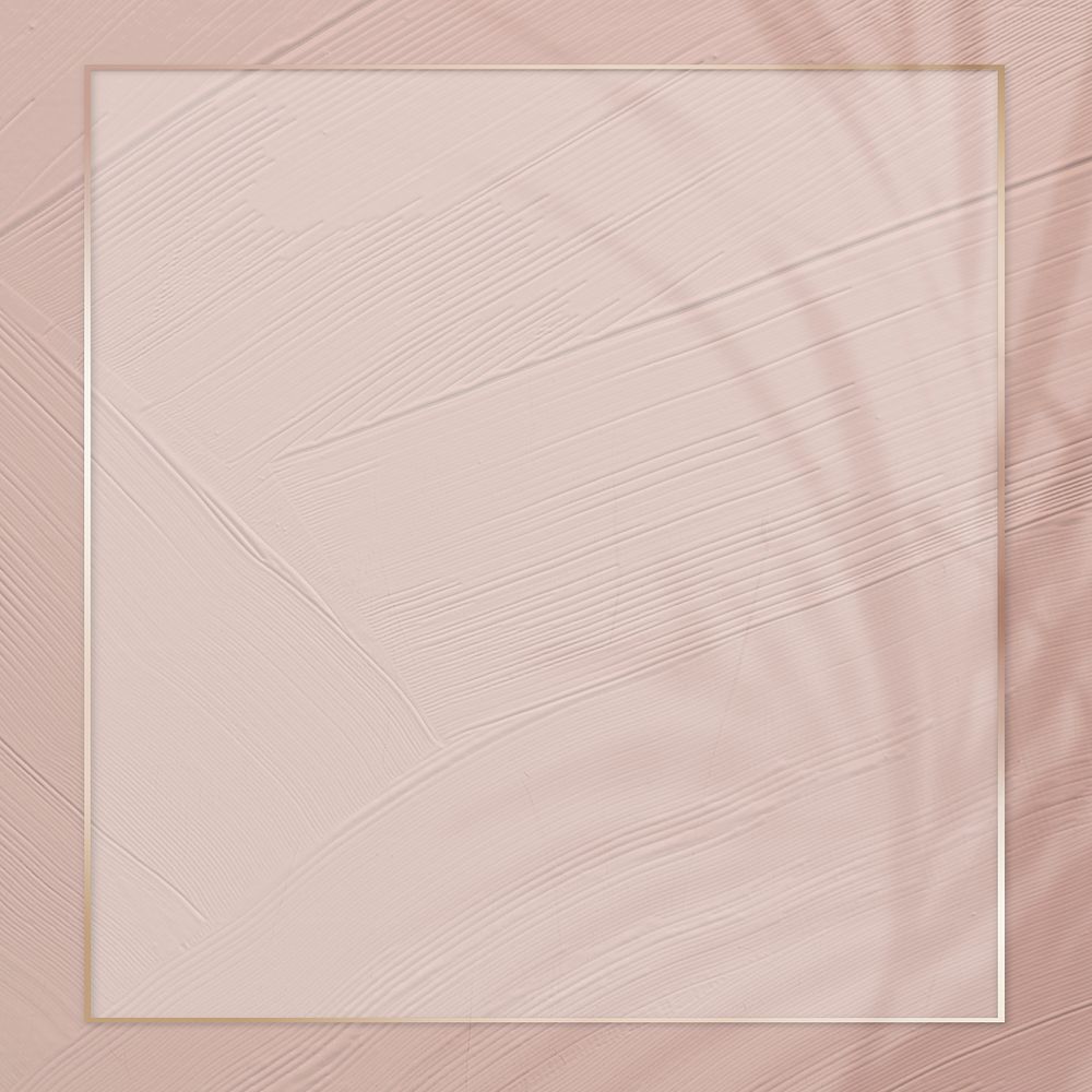 Gold border frame psd on dull pink background with leaf shadow