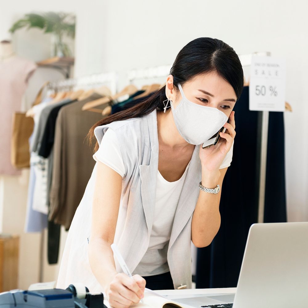 Employee in new normal wearing mask