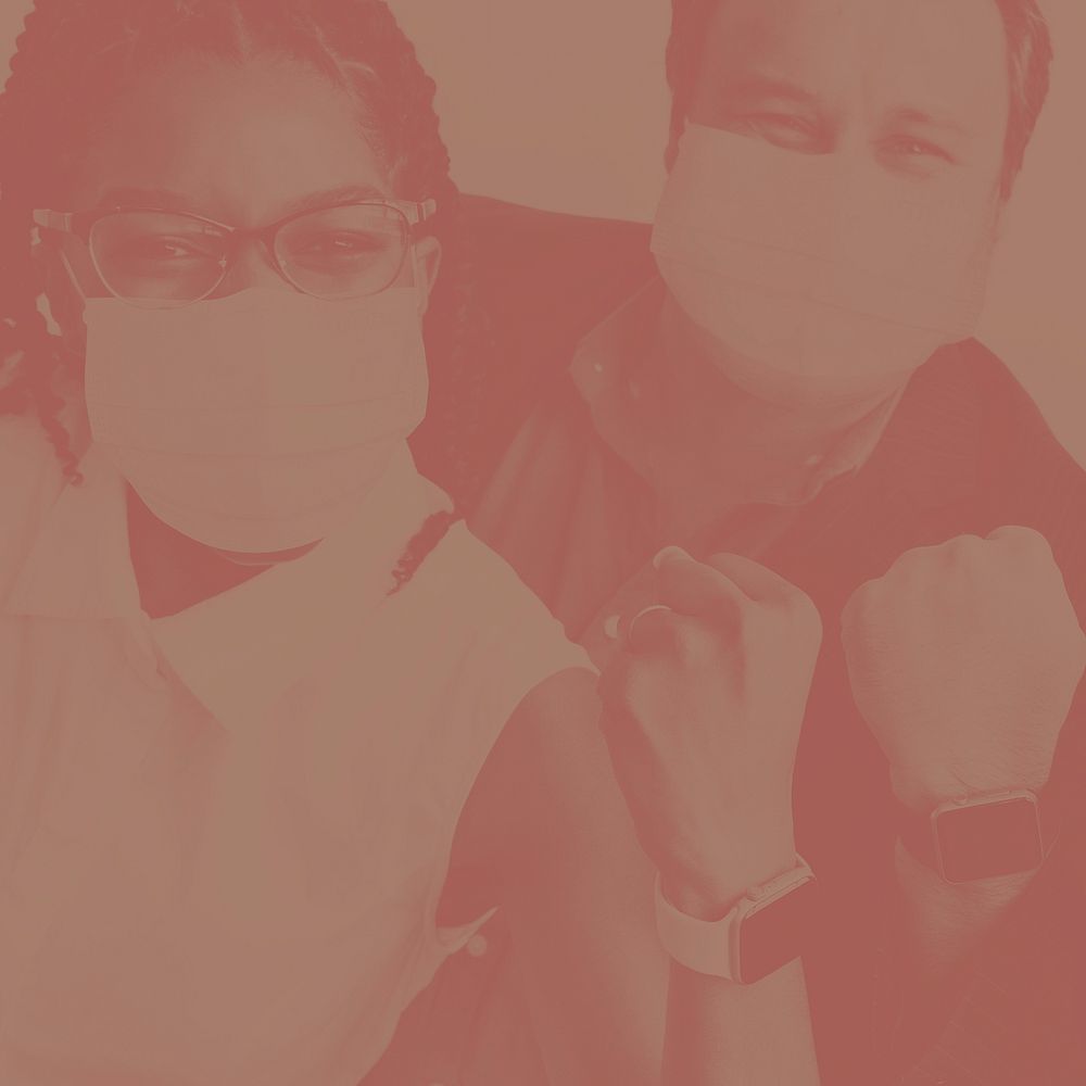 Successful business team wearing face masks during coronavirus pandemic monochrome