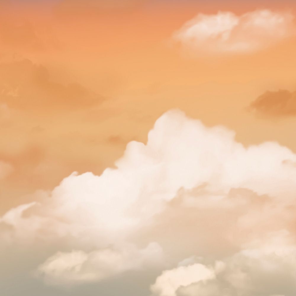Orange sky with clouds background