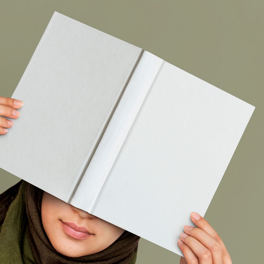 Hardcover book mockup psd in woman's hands