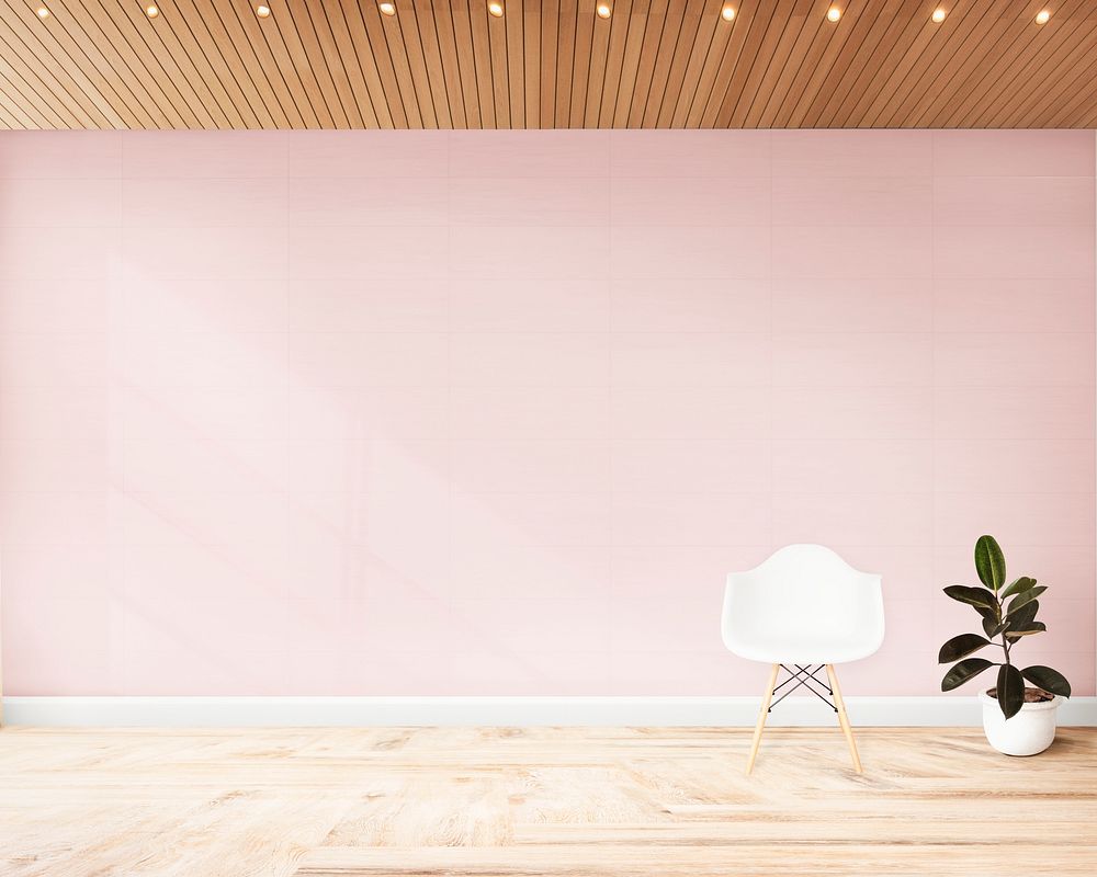 Chair and a plant against a pink wall mockup