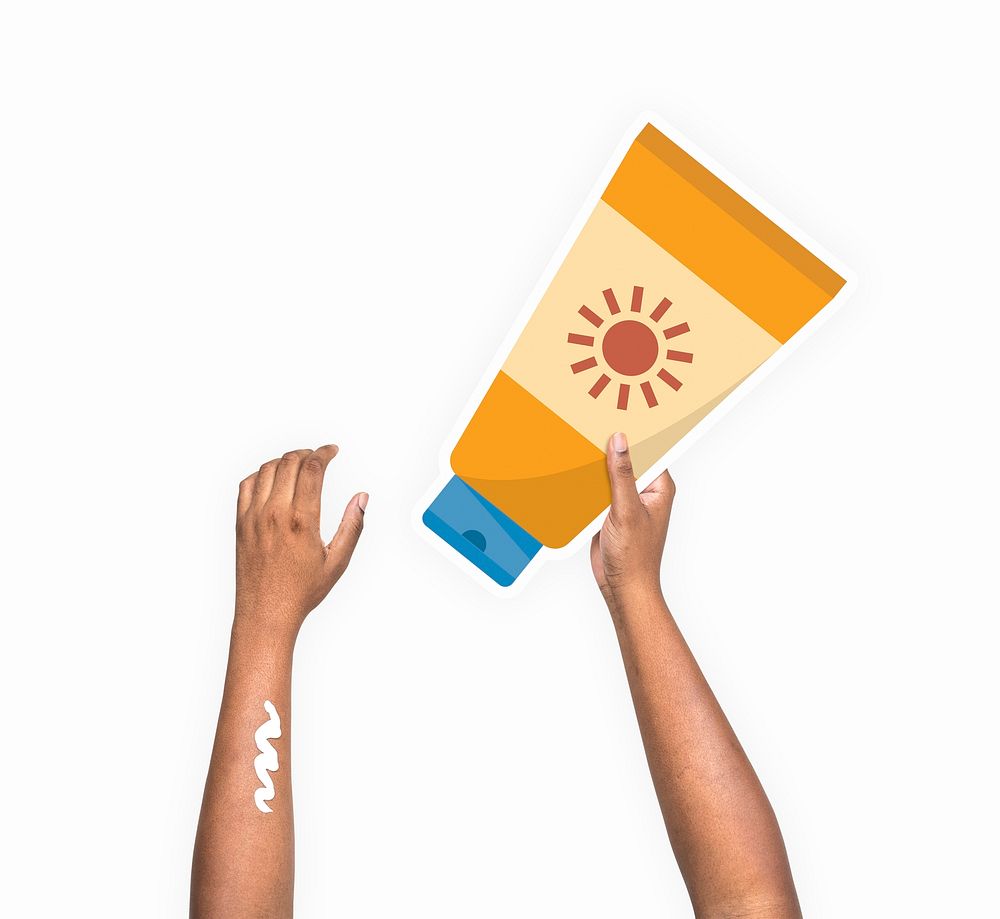 Hand holding a sun screen lotion cardboard prop