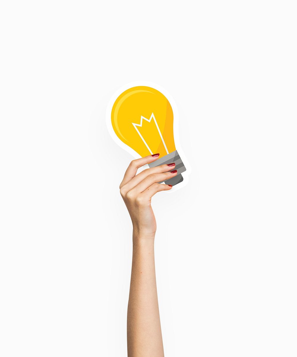 Hand holding a light bulb