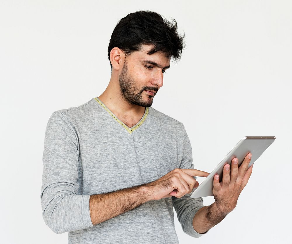 Portrait of a man using a digital tablet
