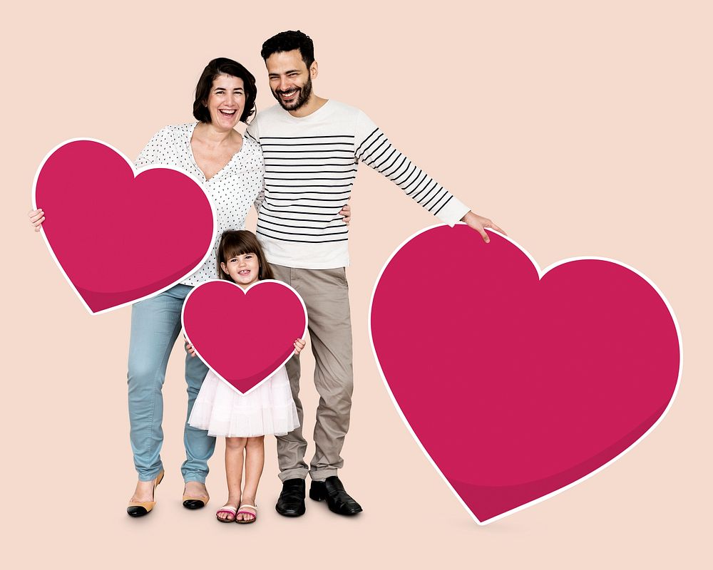 Happy family holding heart shaped icons