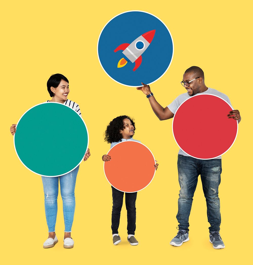 Happy family holding round colorful boards