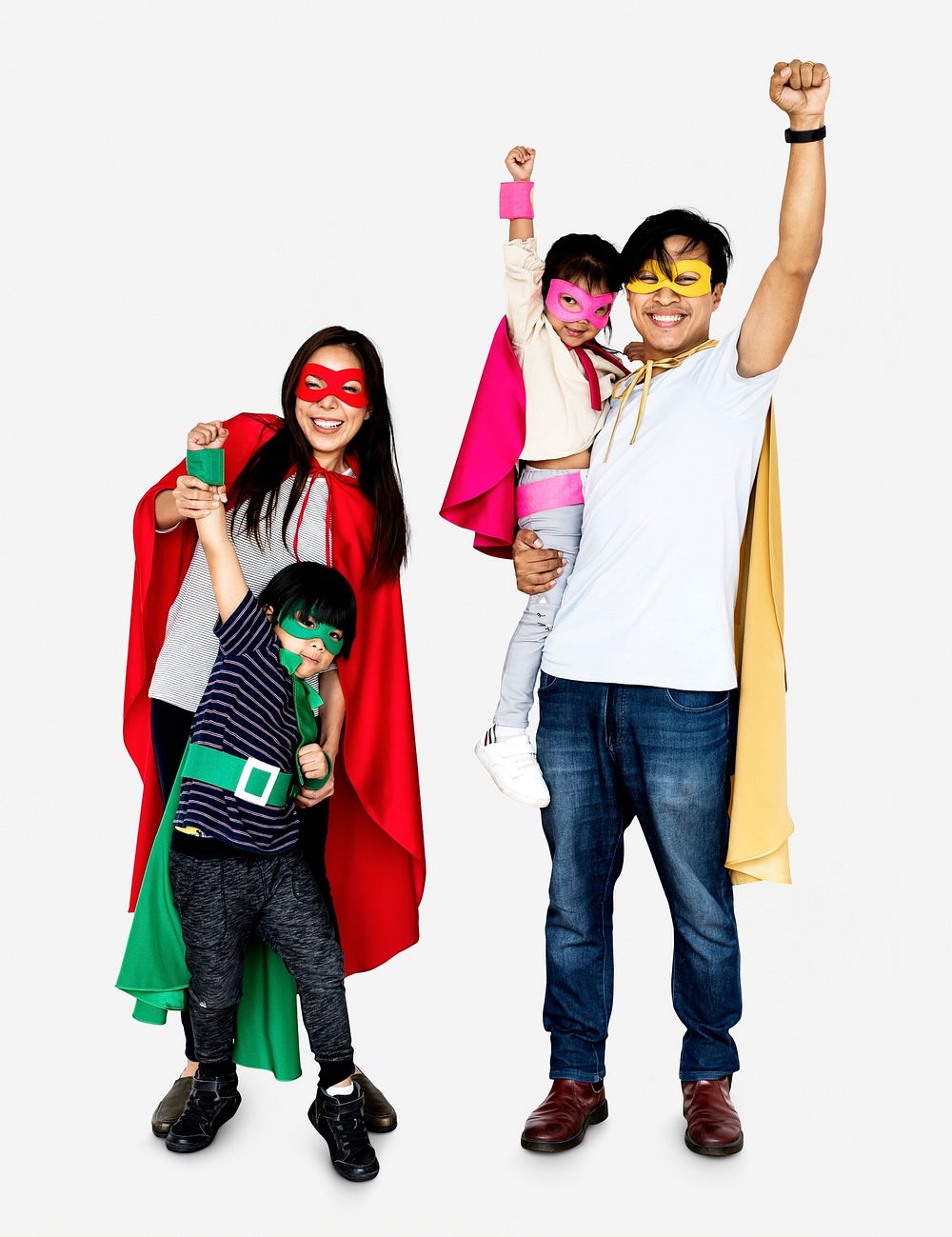 Happy family wearing superhero costumes