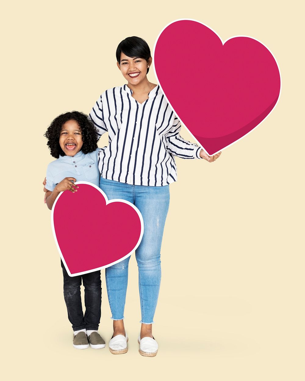 Happy mother and son holding heart icons
