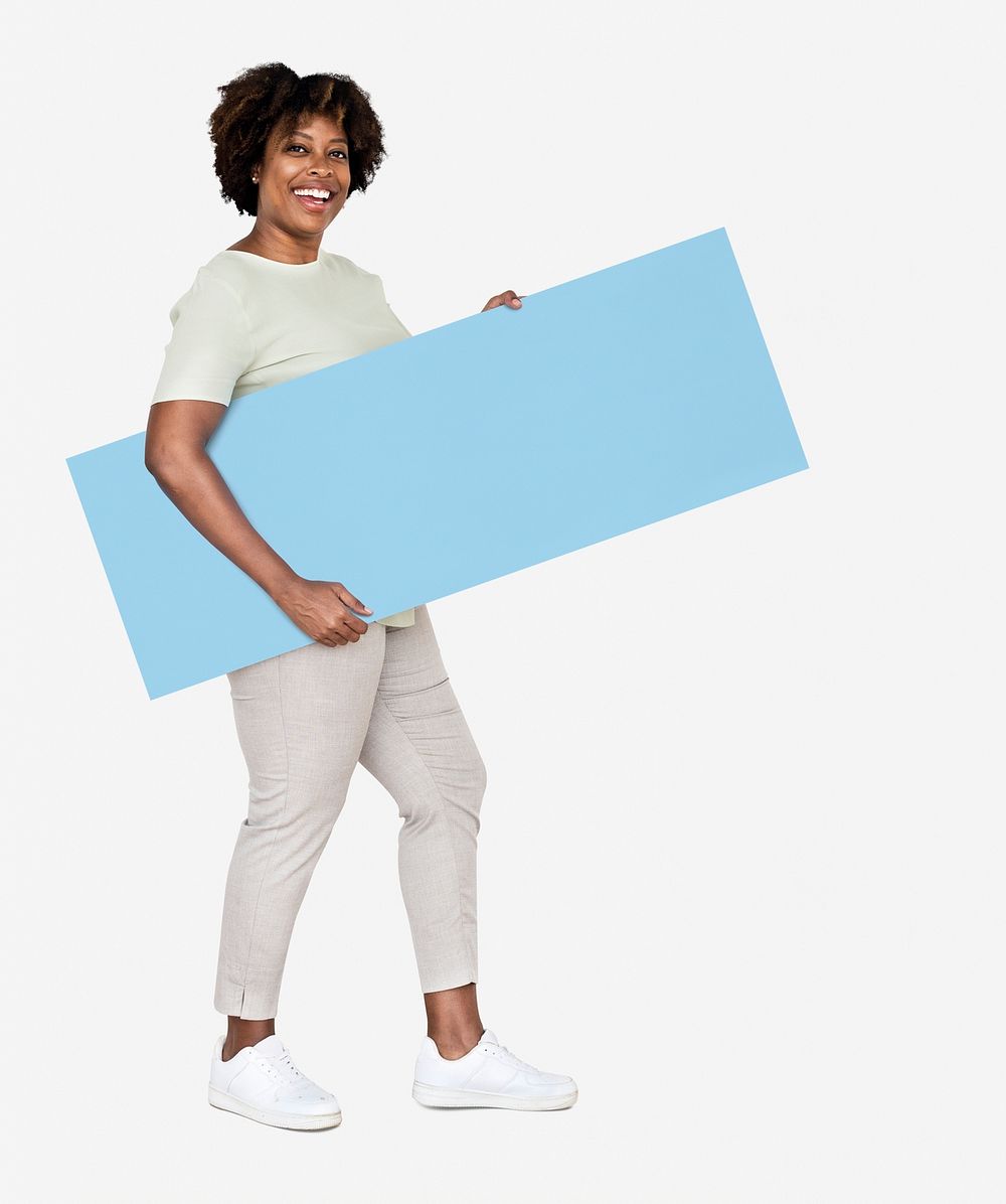 Cheerful woman showing a blank blue banner