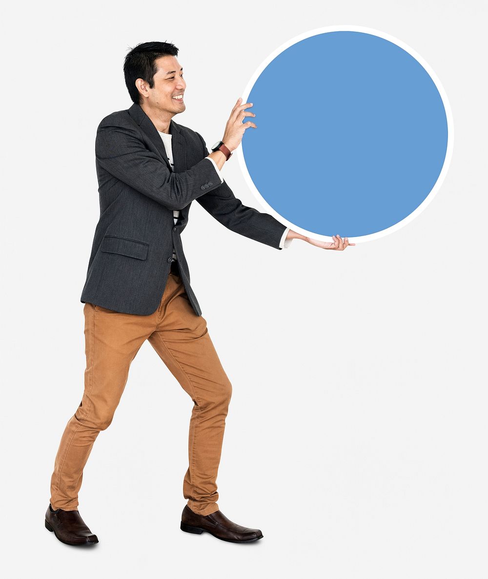 Cheerful businessman holding a blue round board
