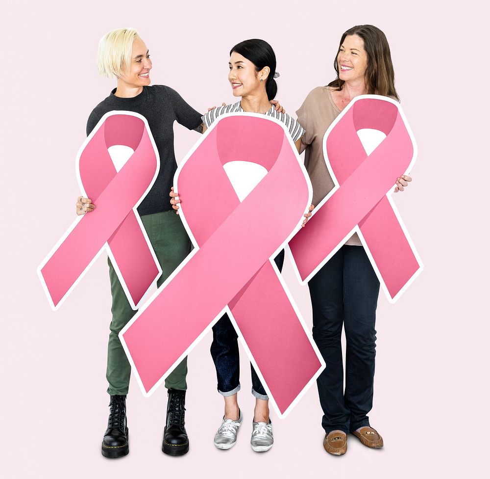Women holding breast cancer symbol