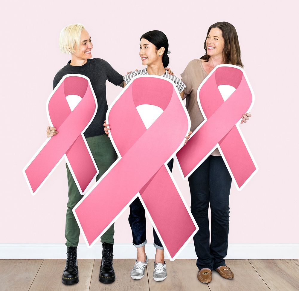 Women holding breast cancer ribbons