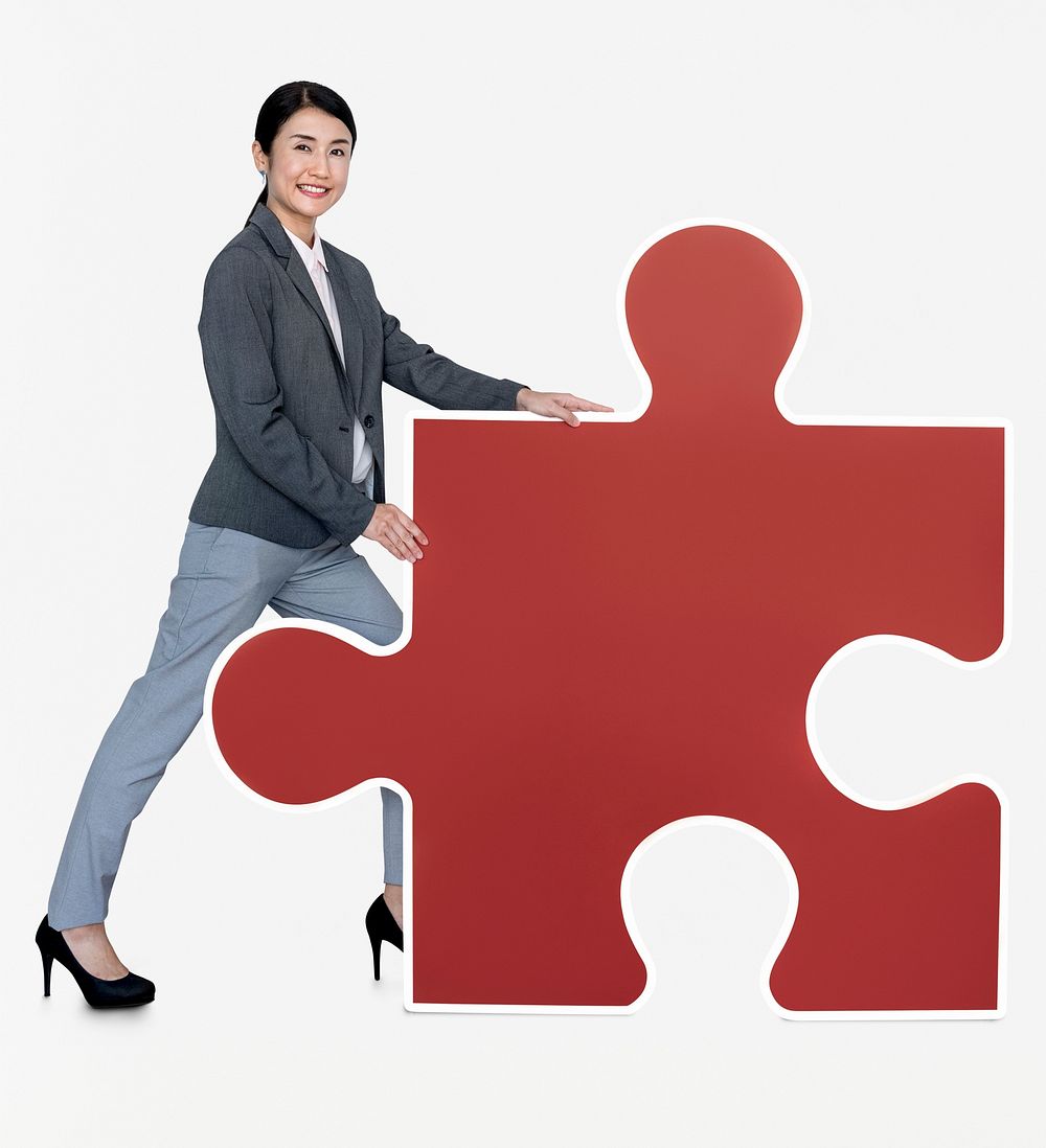 Happy woman holding a puzzle icon