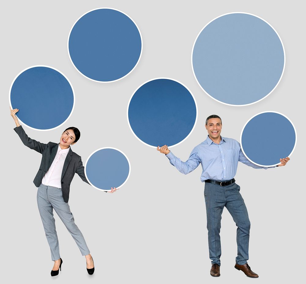 Business partners holding blank circles