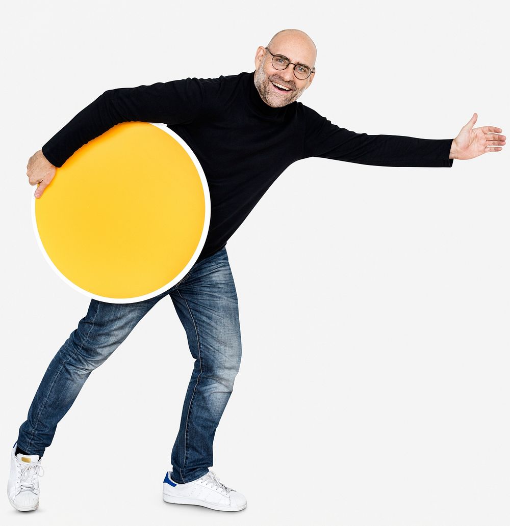 Happy man holding a round yellow board