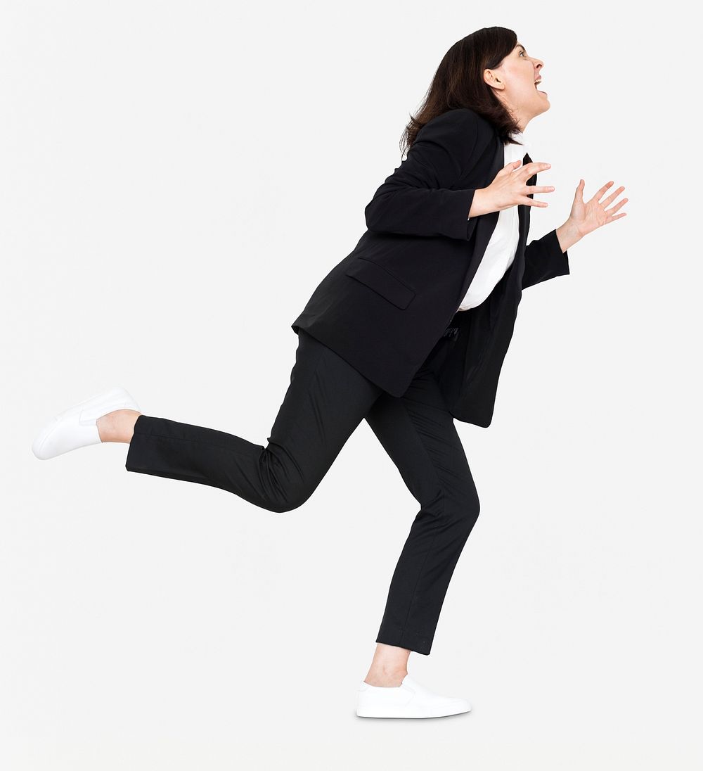 Stressed businesswoman running away from a crisis