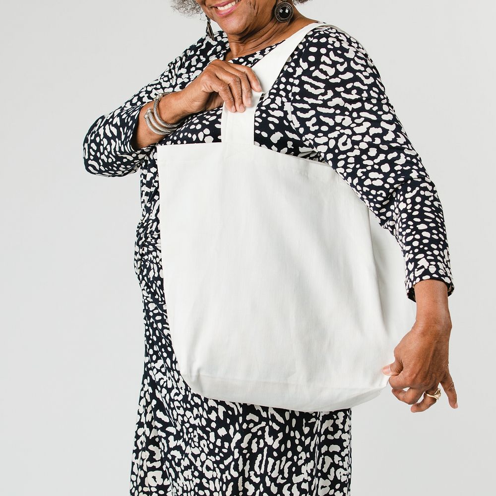 Senior woman holding a tote bag