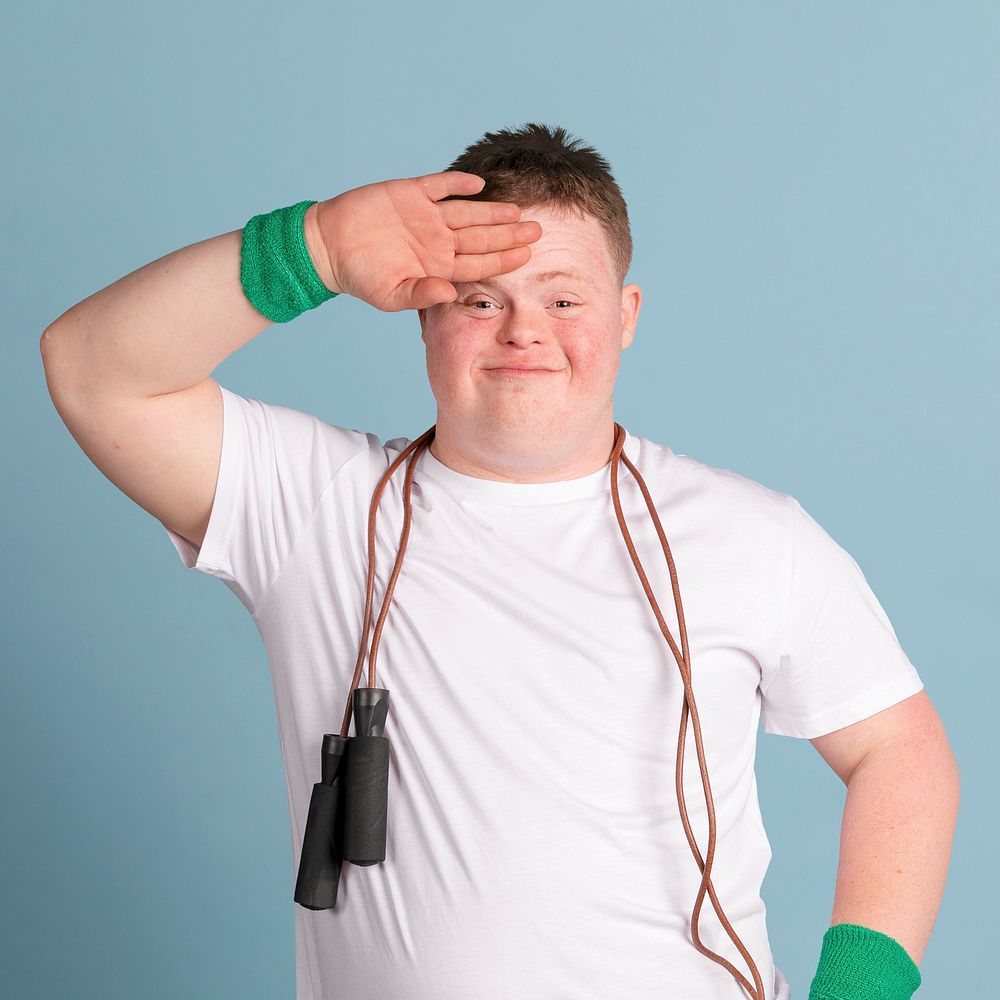 Kid with down syndrome with a skipping rope around his neck 