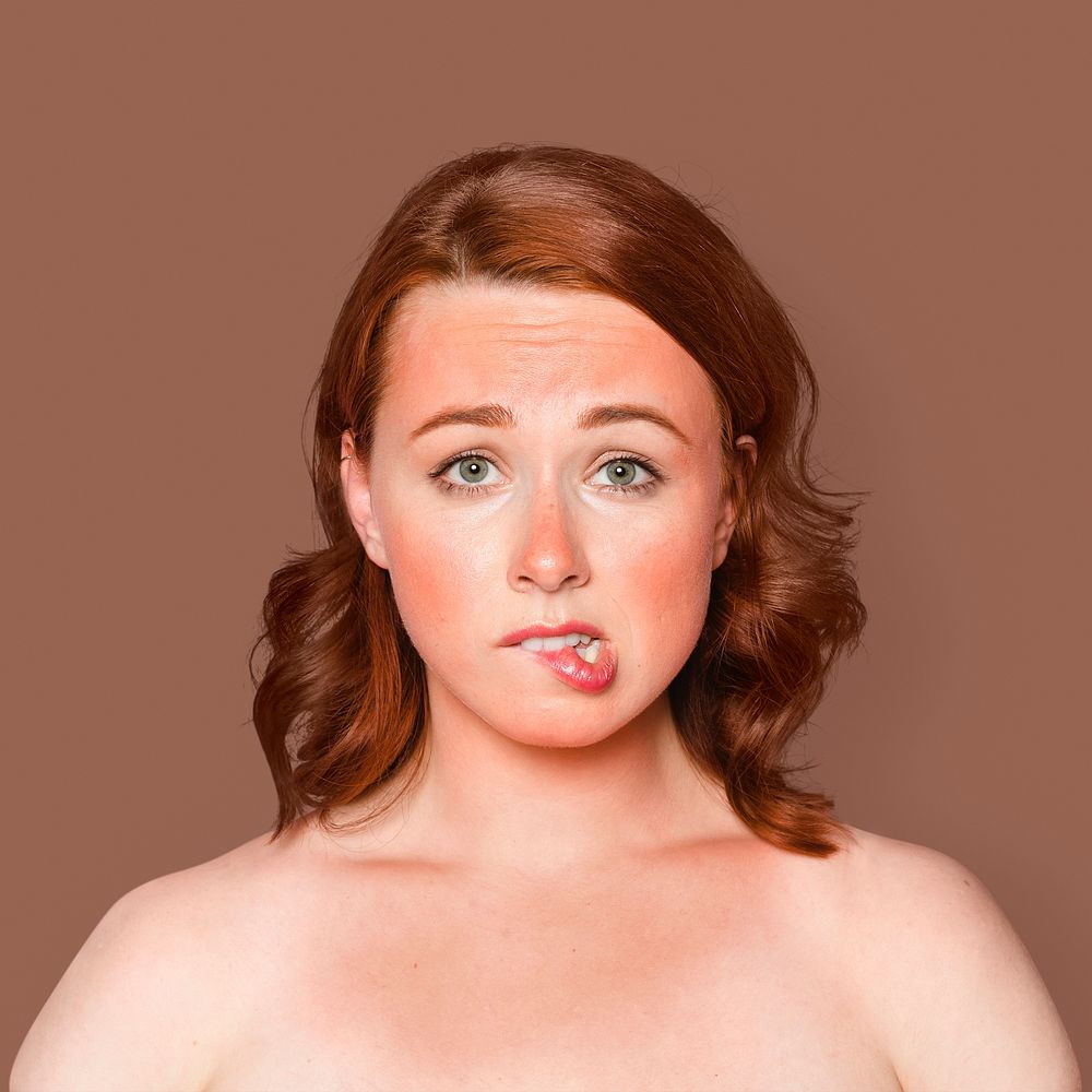 Woman with sunburnt skin biting her lips mockup