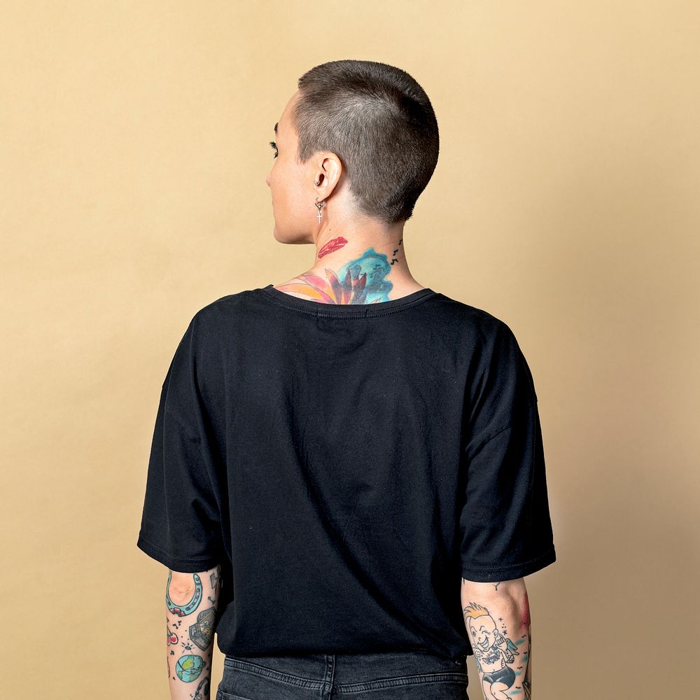 Skinhead model with tattoo in black T shirt