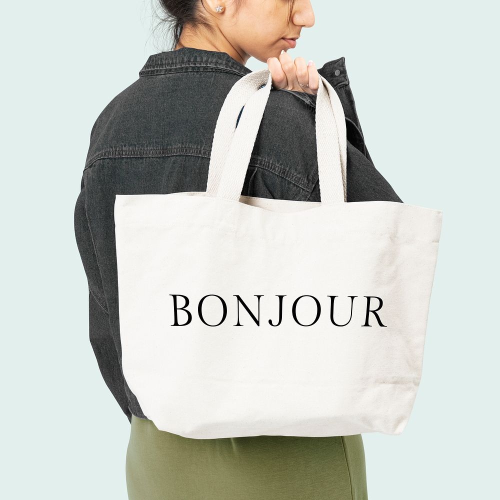 White tote bag with bonjour typography accessory studio shoot